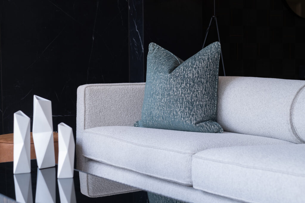Custom-made furniture white couch and glass coffee table