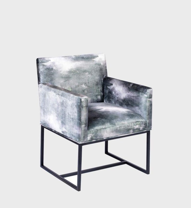 The Madison Dining Chair merges bold color with minimalist geometry. Upholstered in rich mustard velvet, it offers a warm, modern aesthetic.