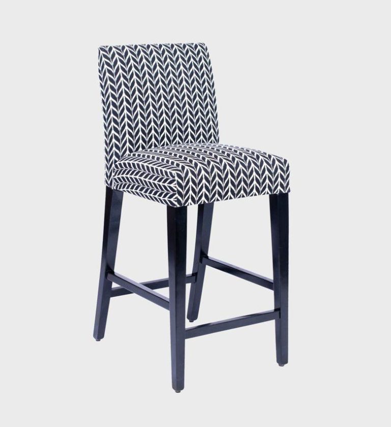 The Cognac Bar Stool MD brings bold pattern and modern comfort together. Upholstered in a striking black‑and‑white chevron fabric