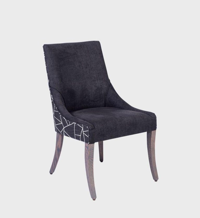 The Catherine Dining Chair MD embodies understated glamour with its sleek silhouette and tailored upholstery.