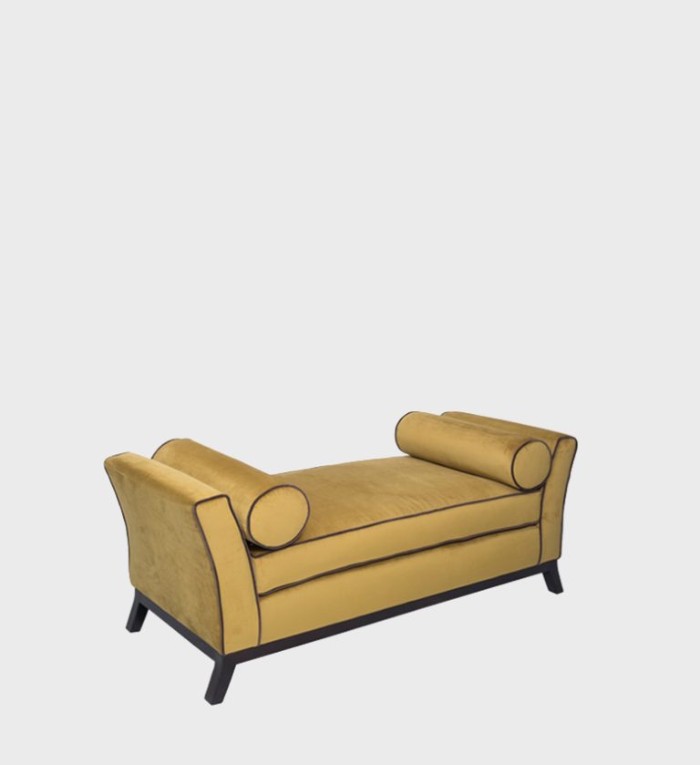 The Belinda Daybed exudes timeless sophistication with its sculpted silhouette and plush black velvet upholstery.