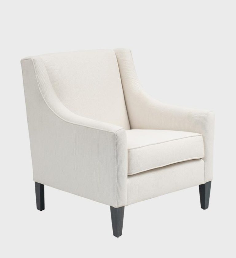 The Shirley Armchair embodies timeless elegance with a contemporary edge. Upholstered in a textured taupe fabric, it features gently flared arms and a high back