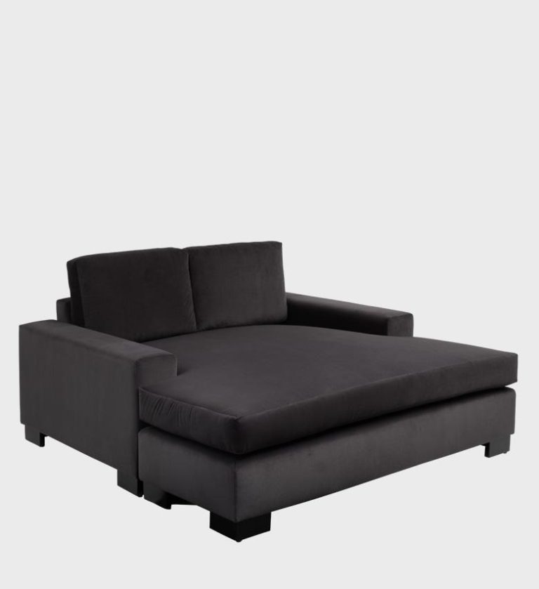 The Hampton Daybed embodies contemporary comfort with its generous proportions and deep charcoal upholstery.