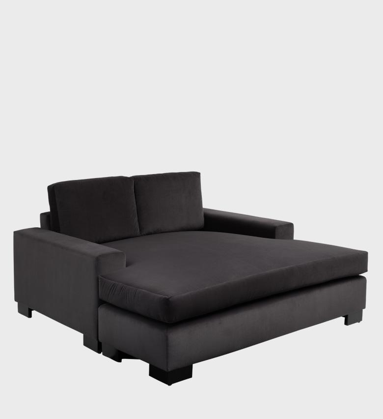 The Hampton Daybed embodies contemporary comfort with its generous proportions and deep charcoal upholstery.