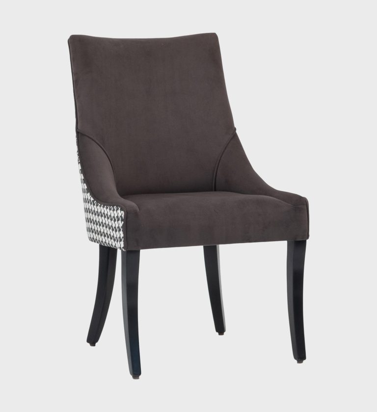 The Catherine Dining Chair MD embodies understated glamour with its sleek silhouette and tailored upholstery.
