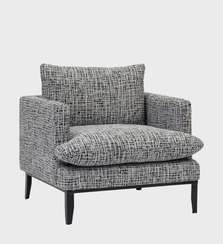 The Penthouse Chair embodies urban sophistication with its structured silhouette and plush comfort. Upholstered in a textured black‑and‑white crosshatch fabric, it offers a refined yet contemporary aesthetic.