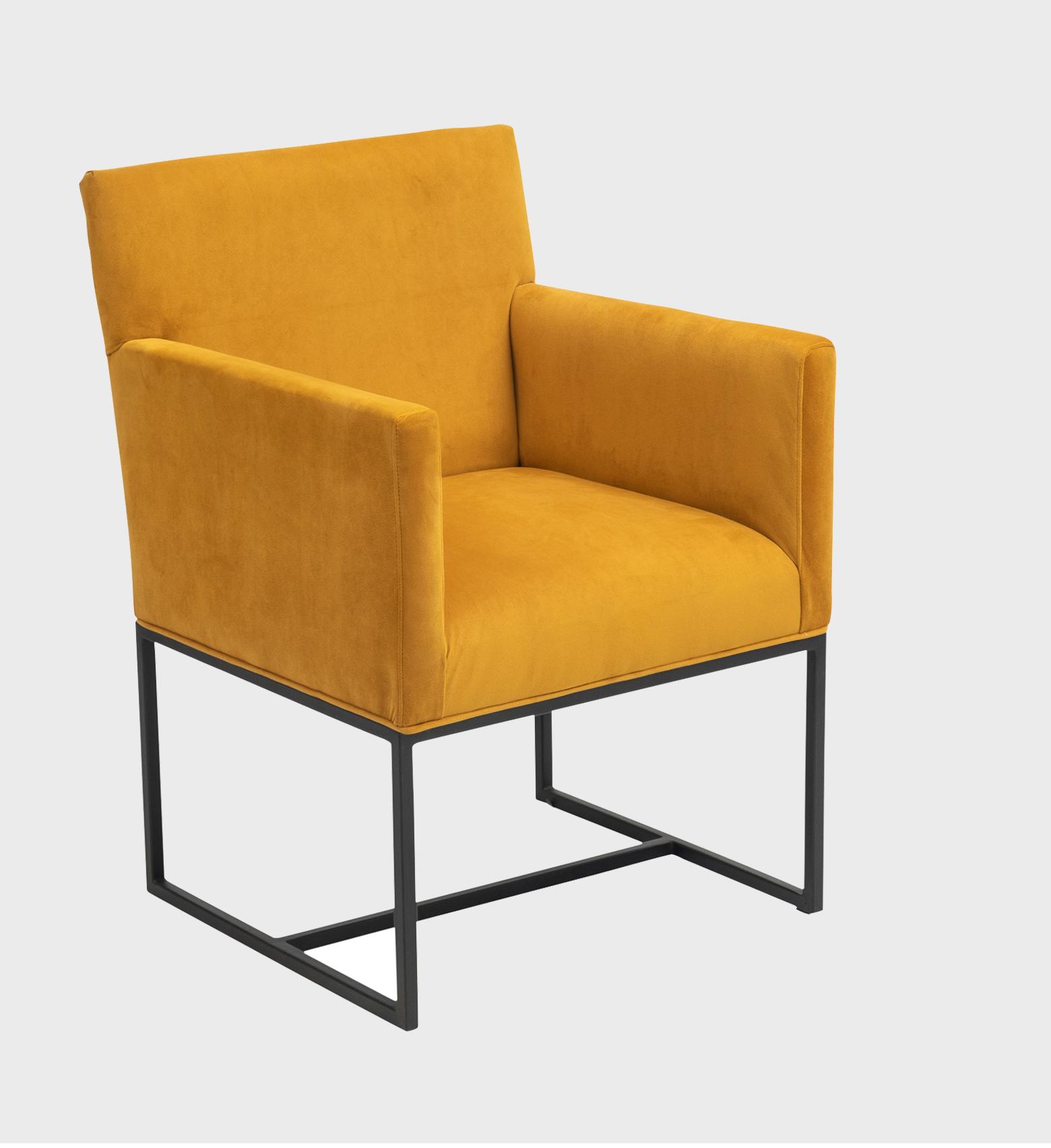 The Madison Dining Chair merges bold color with minimalist geometry. Upholstered in rich mustard velvet, it offers a warm, modern aesthetic.