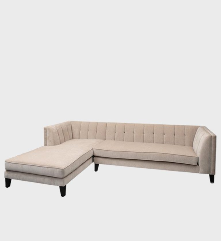 The Gosling Daybed is a refined blend of comfort and architectural elegance. Upholstered in a soft taupe fabric, it features vertical channel tufting along the back and sides, creating a subtle rhythm that enhances its modern silhouette.