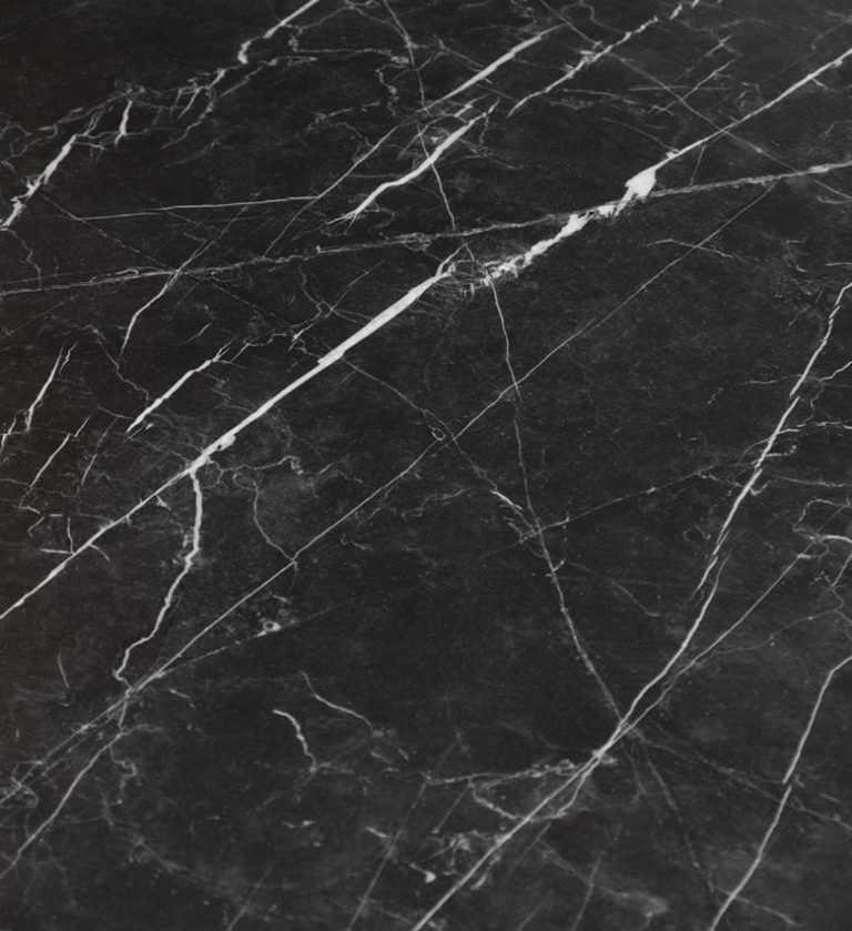 The Opulence Dining Table is a statement of refined luxury and modern geometry. Its polished white marble top, veined with soft gray patterns, exudes timeless elegance and lightness.