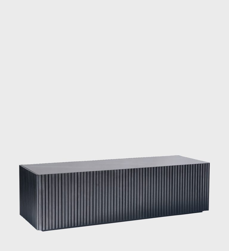 The Venice Rectangular Coffee Table Ebony / Calacatta is a bold statement of modern refinement. Its elongated form features a vertically fluted façade in deep ebony, creating rhythmic texture and architectural depth.