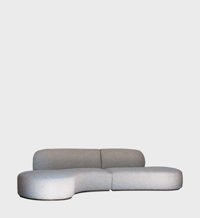 The Noir Sofa is a sculptural centerpiece that embodies organic modernism and refined comfort.