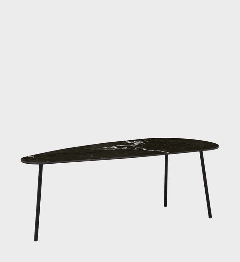 The Odd Shaped Nesting Coffee Table set is a sculptural composition of organic forms and refined materials. Each table features a smooth, asymmetrical top — two in white marble with delicate veining and one in dark stone — supported by slender black metal legs. The layered arrangement creates visual rhythm and versatility, allowing dynamic configurations that suit both minimalist and artistic interiors. A perfect blend of fluid design and modern sophistication.