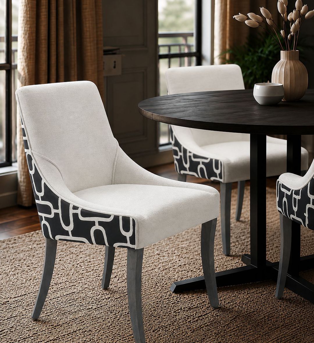 The Catherine Dining Chair MD embodies understated glamour with its sleek silhouette and tailored upholstery.
