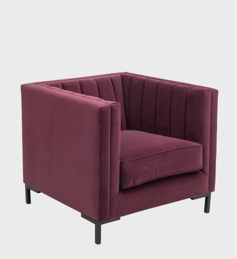 The Nappa Chair embodies sleek modern luxury with its structured silhouette and supple brown leather upholstery.