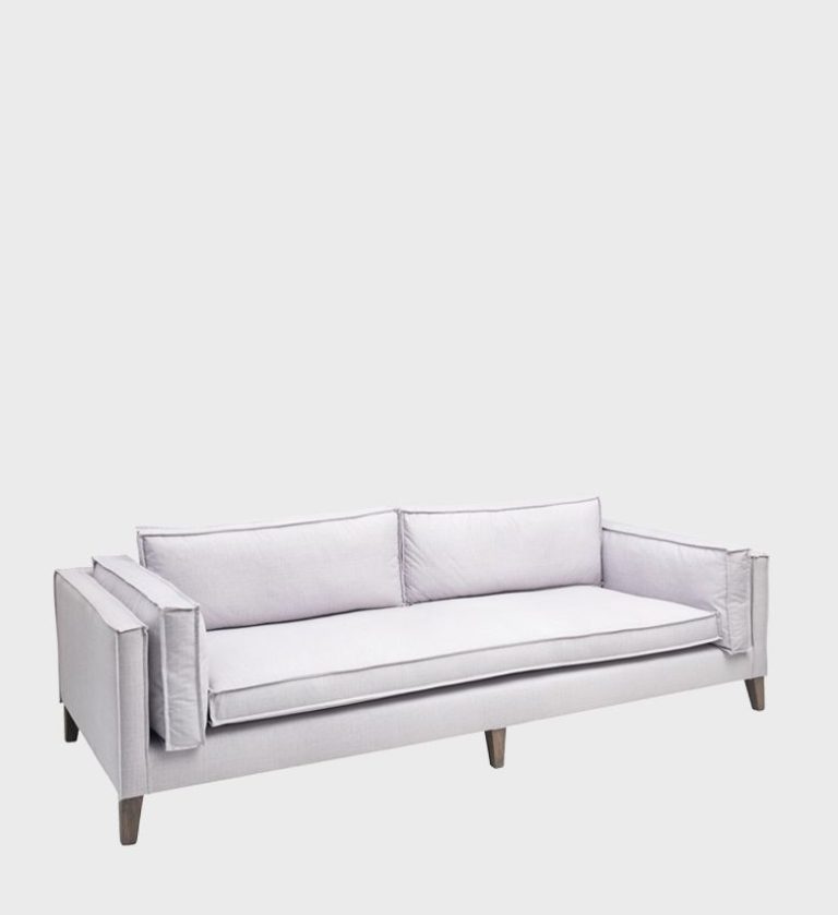 The Chloe Sofa exudes effortless elegance with its clean lines and tailored silhouette. Upholstered in a soft, light fabric, it features deep seat cushions and slim back pillows for a refined yet inviting look.